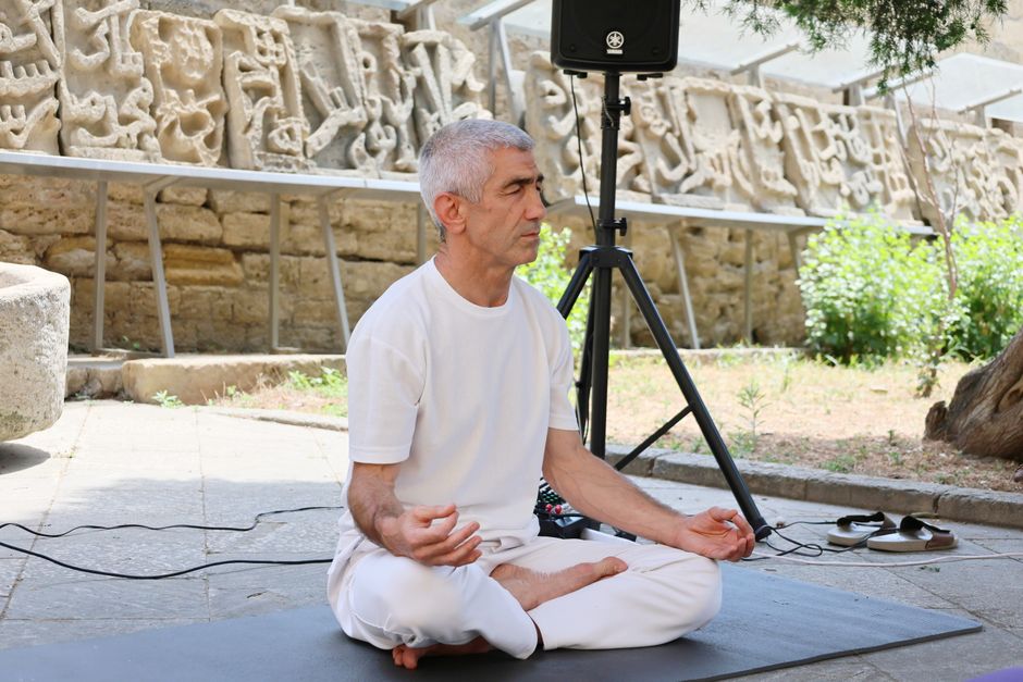 Students seated in a circle during a guided breathwork session